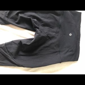 Lululemon black barre pant size 4. Mesh and laser